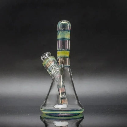 Clear glass water pipe with colorful striped mouthpiece and removable downstem