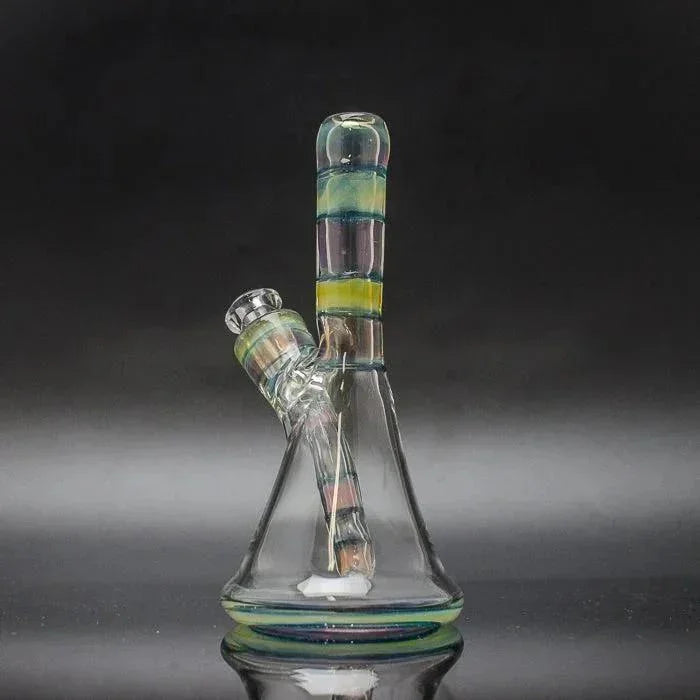 Clear glass water pipe with colorful striped mouthpiece and removable downstem