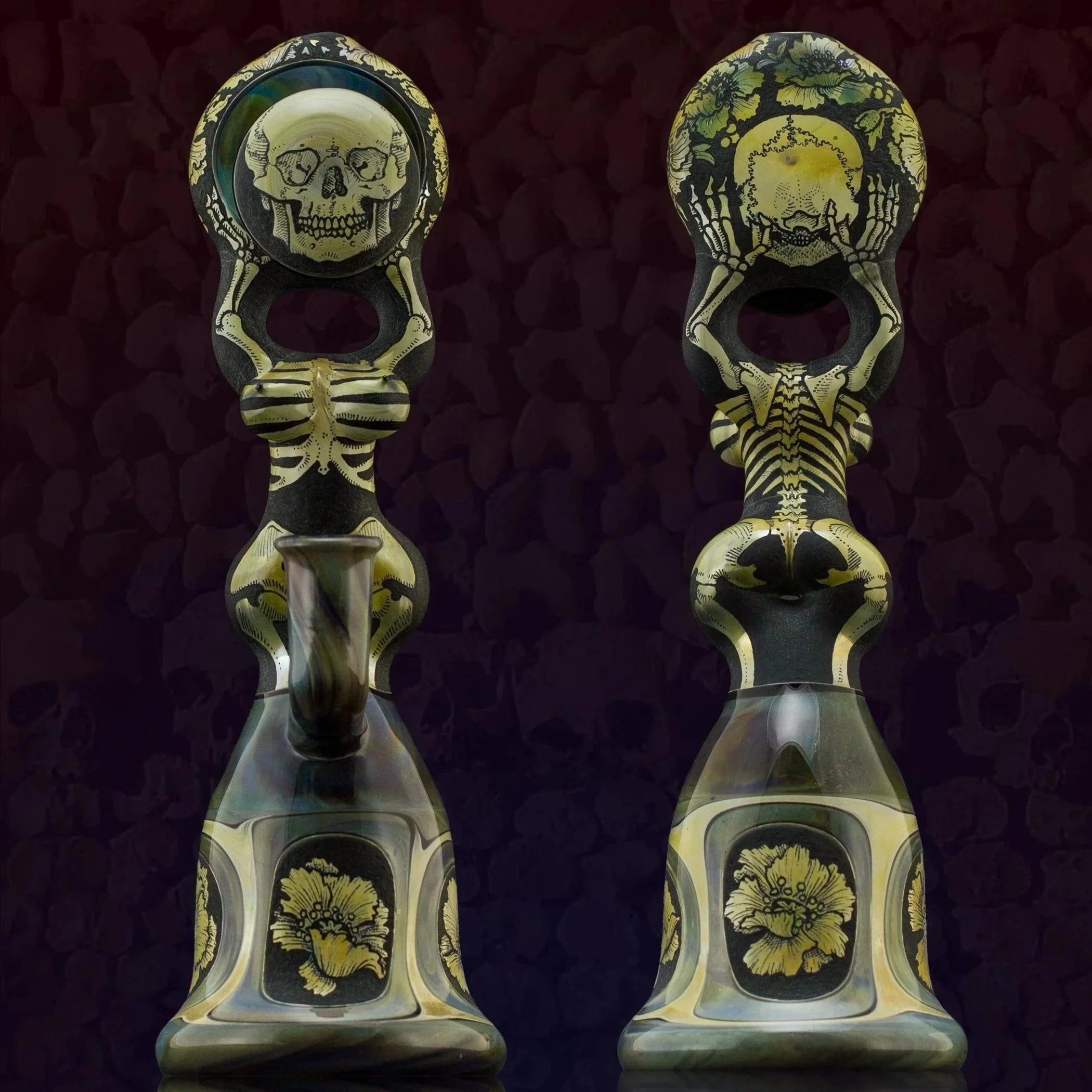 Heady glass water pipe with skull, skeleton, and floral designs, shown front and back