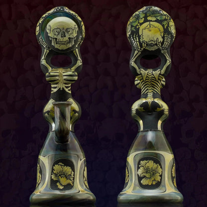 Heady glass water pipe with skull, skeleton, and floral designs, shown front and back
