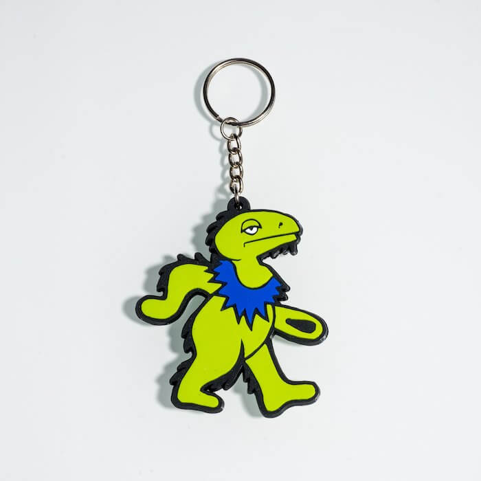 product shot of green dancing dinosaur keychain made by elbo